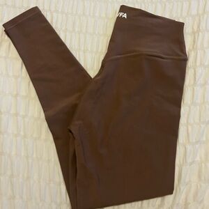 White fox • Brown athletic leggings